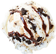 A photo of a scoop of Marble Slab Creamery's cookie dough surprise ice cream